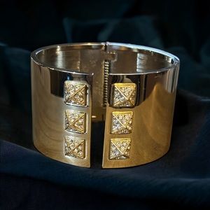Victoria’s Secret wide gold tone hinged bracelet